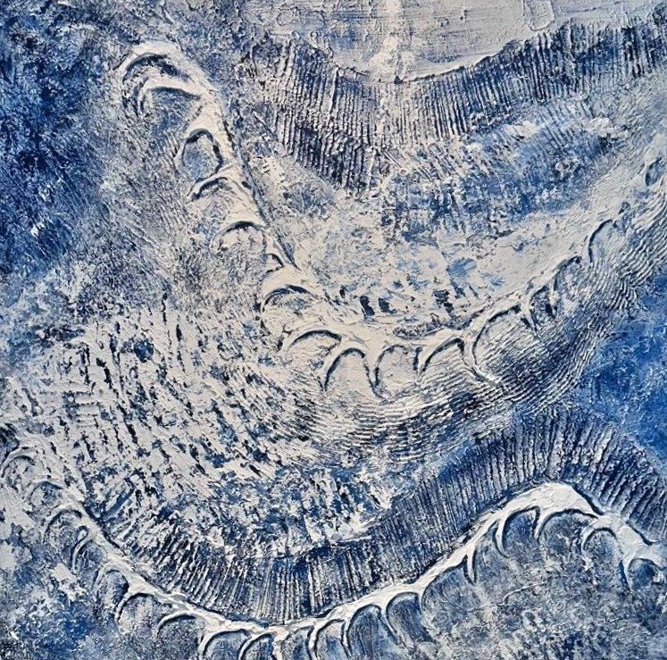 Blue and white painting with raised arcs of foam